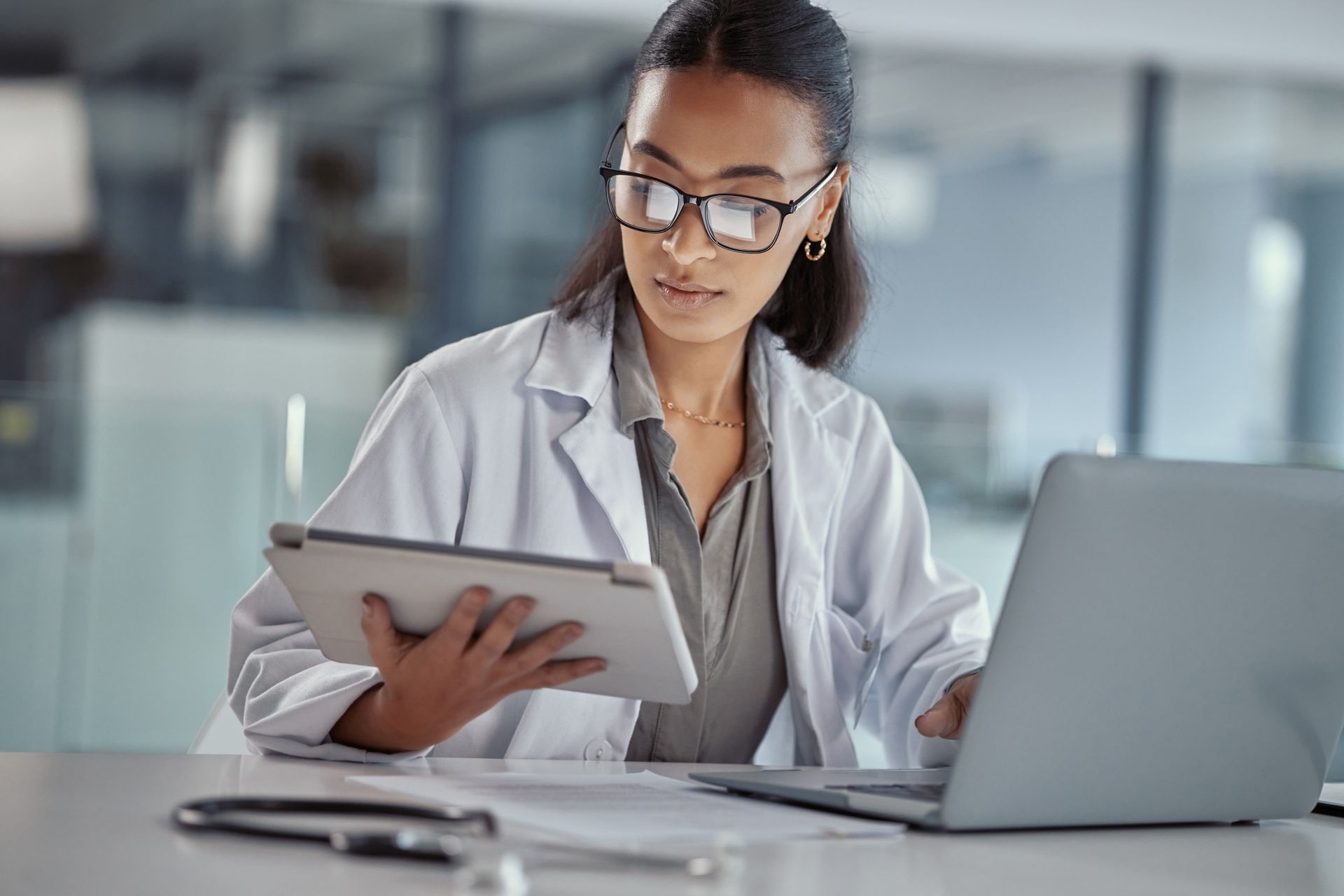 Female doctor working with Laptop