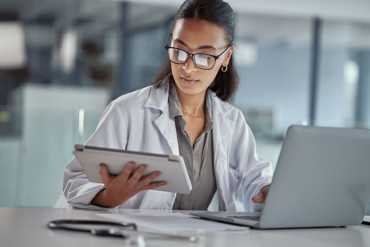 Female doctor working with Laptop