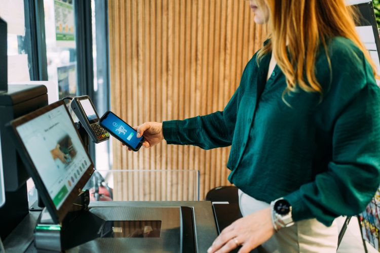 Woman uses loyalty App