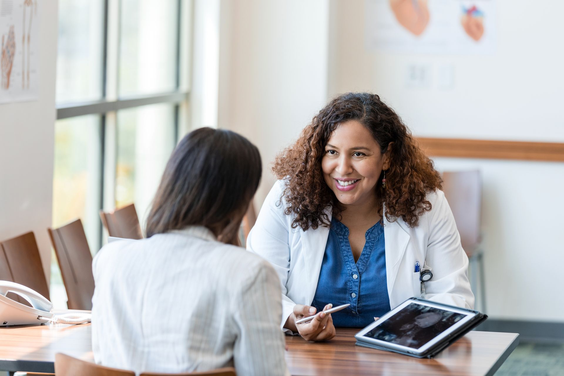 Doctor and Patient with Tablet
