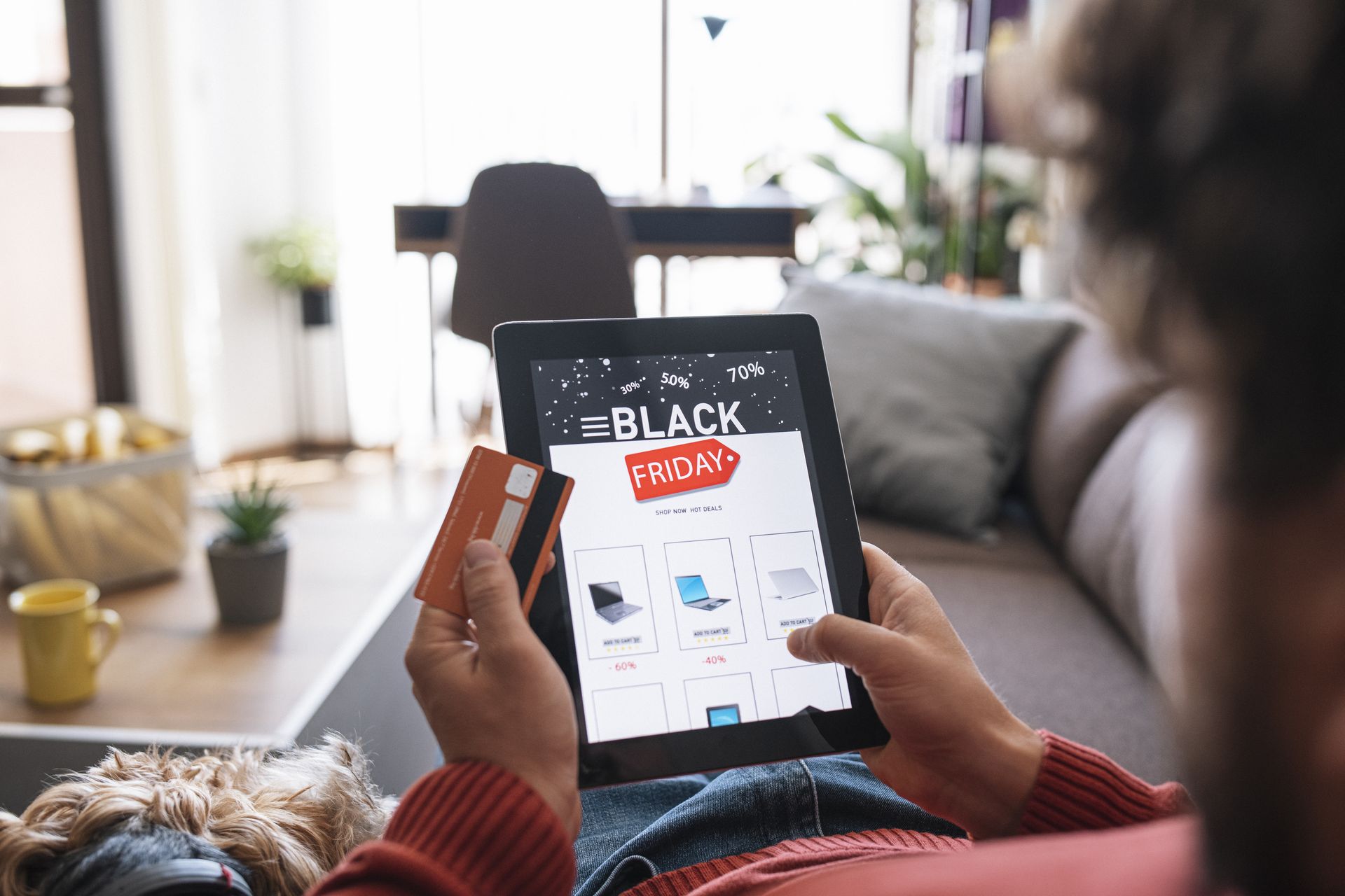 Man shops on Black Friday via iPad