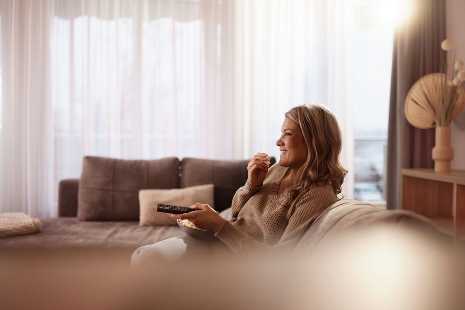 Woman streaming TV