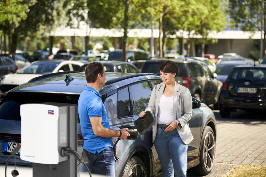 People charging their Car at a SMA Charging Point