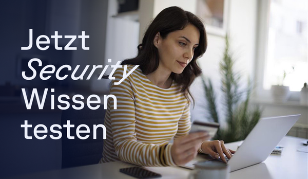 Woman in a striped shirt holding a card, using a laptop at a table. Text in German: "Jetzt Security Wissen testen."