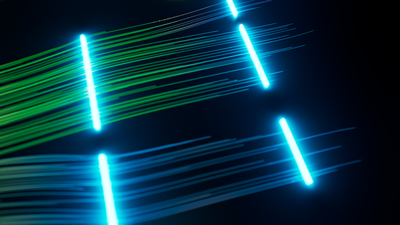 Data represented by luminous lines clustered together by colour. One group is in green, the other is in blue