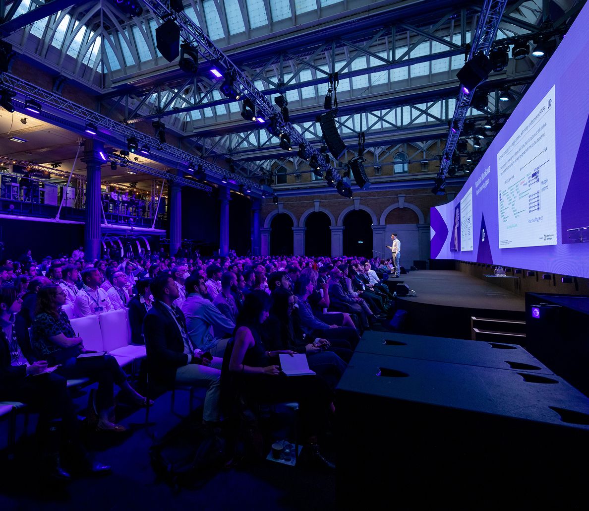 A large audience watching a plenary talk at London Calling