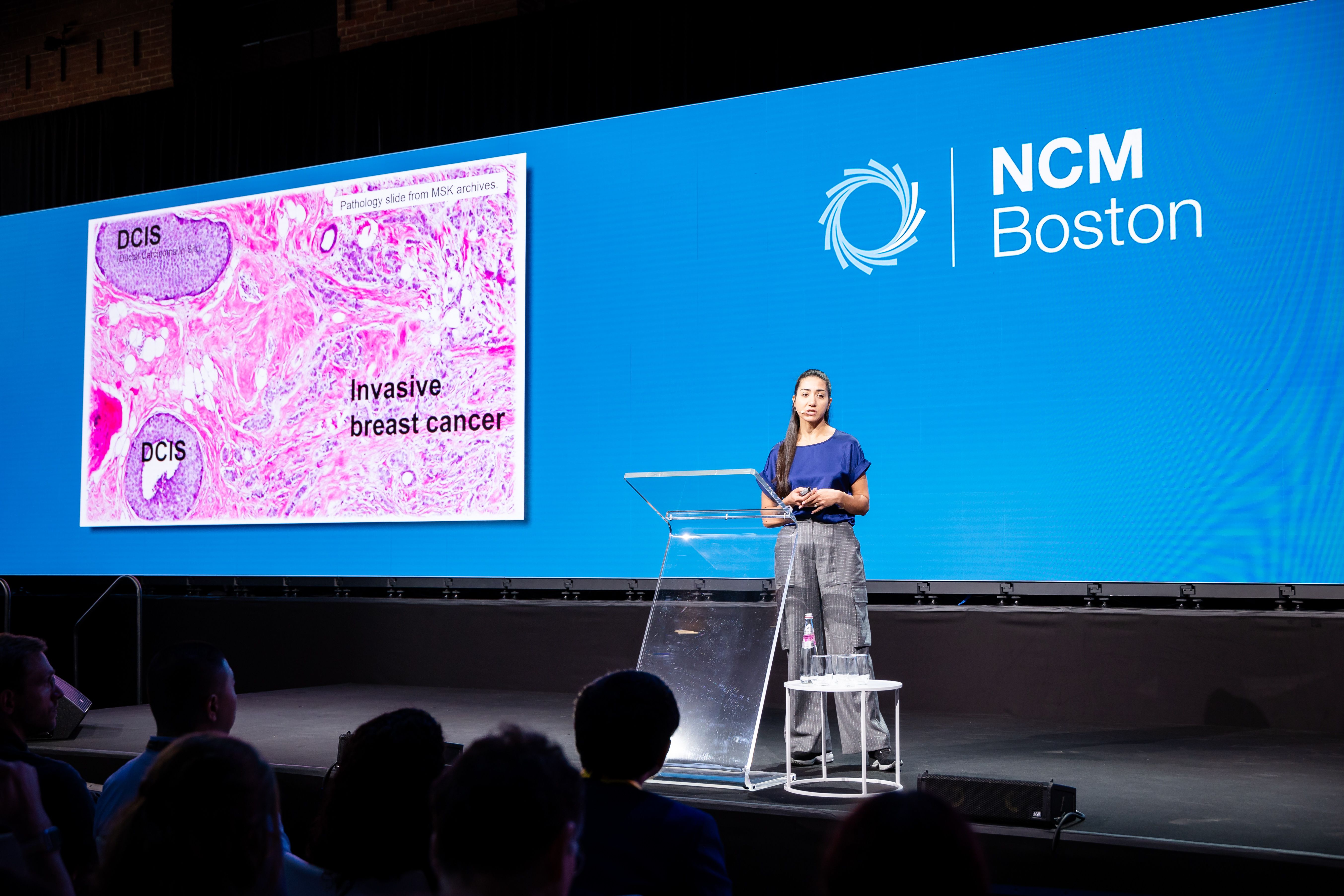 Stephanie Chrysanthou presenting at NCM on stage