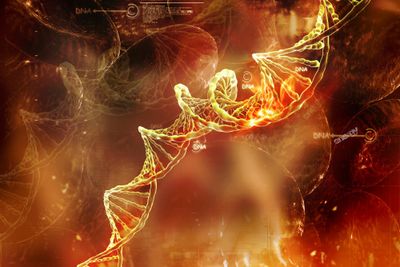 Yellow DNA double helix on red and orange background