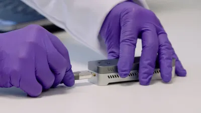 cable being plugged into a MinION