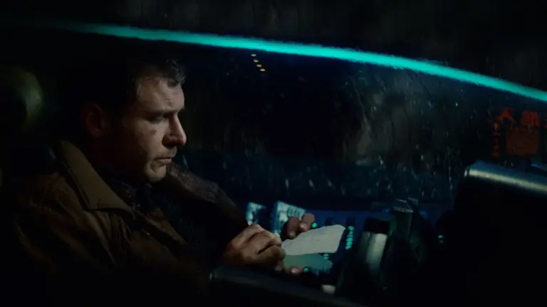 Side profile of a man in a futuristic cockpit
