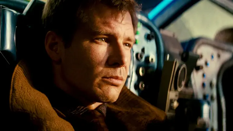Side profile of a man in a futuristic cockpit
