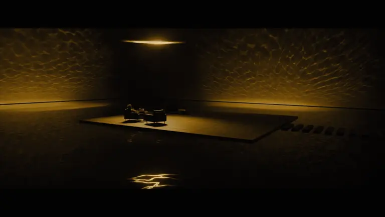 Man sitting in meeting room covered in yellow light
