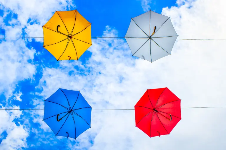 Asymmetrical balance with four umbrellas