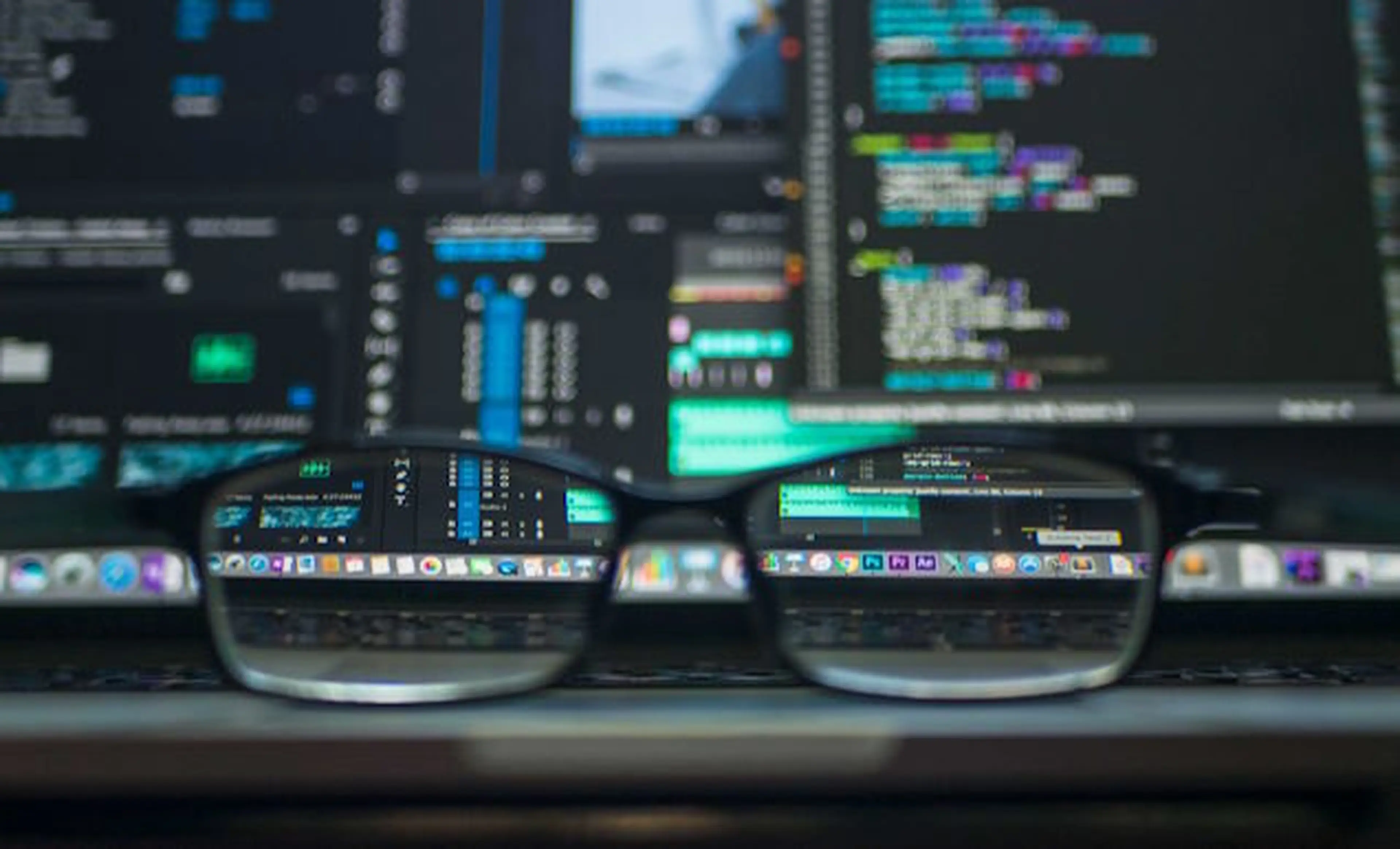 Multiple software applications viewed through a pair of eyeglasses.