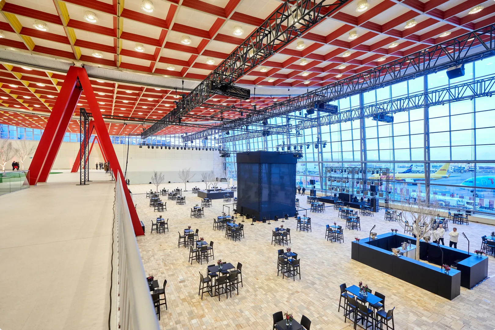 Large and spacious venue with big window with views on airplanes