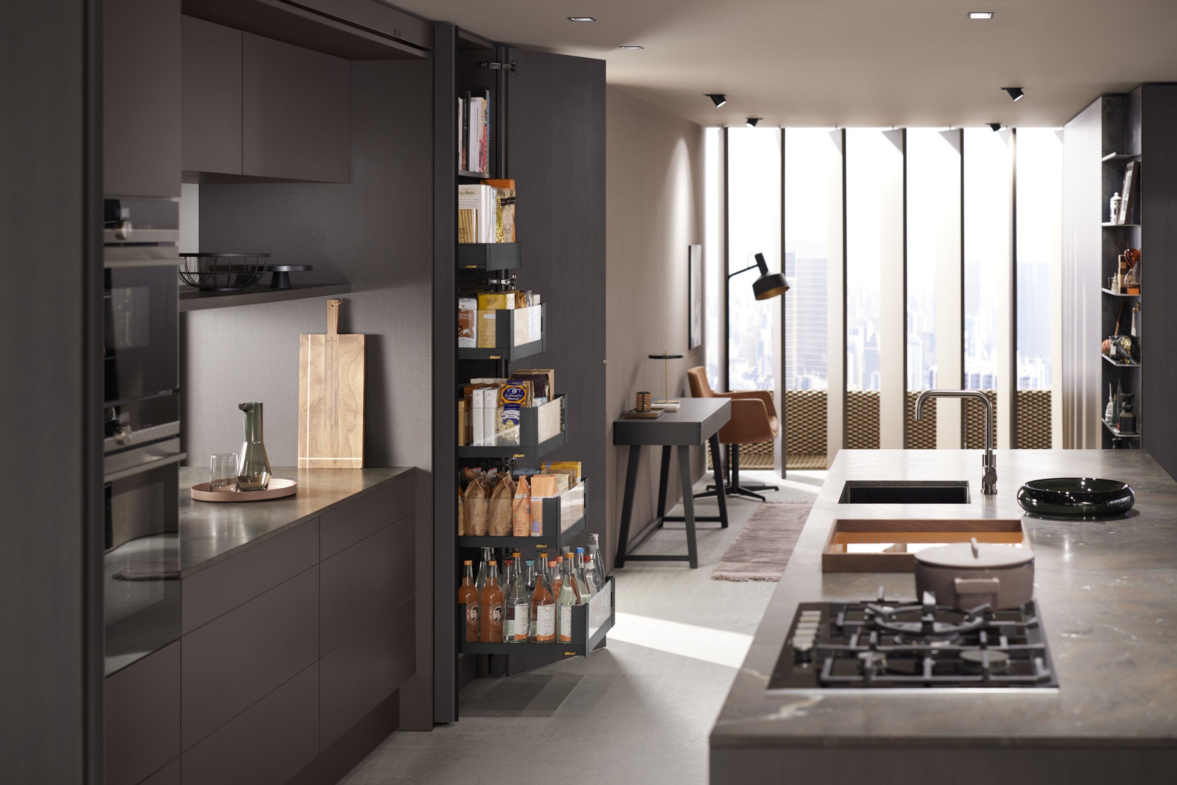 A pantry unit with the drawers rolled out to show bottles and dry pantry goods