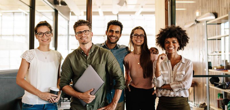 Satisfied office workers lineup celebrating success lineup of workers celebrating success