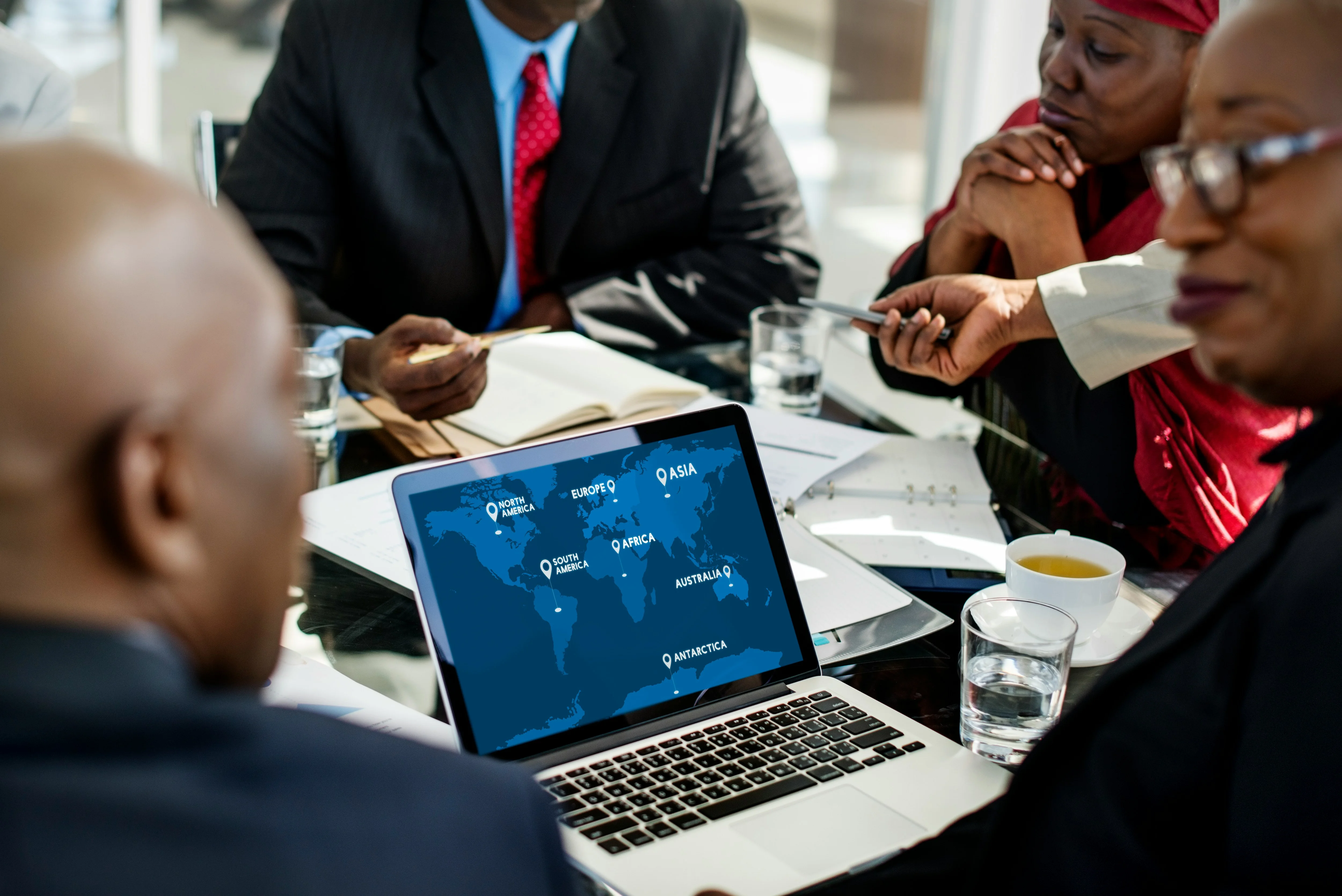 photo of global payroll strategy meeting about cost of global payroll management services