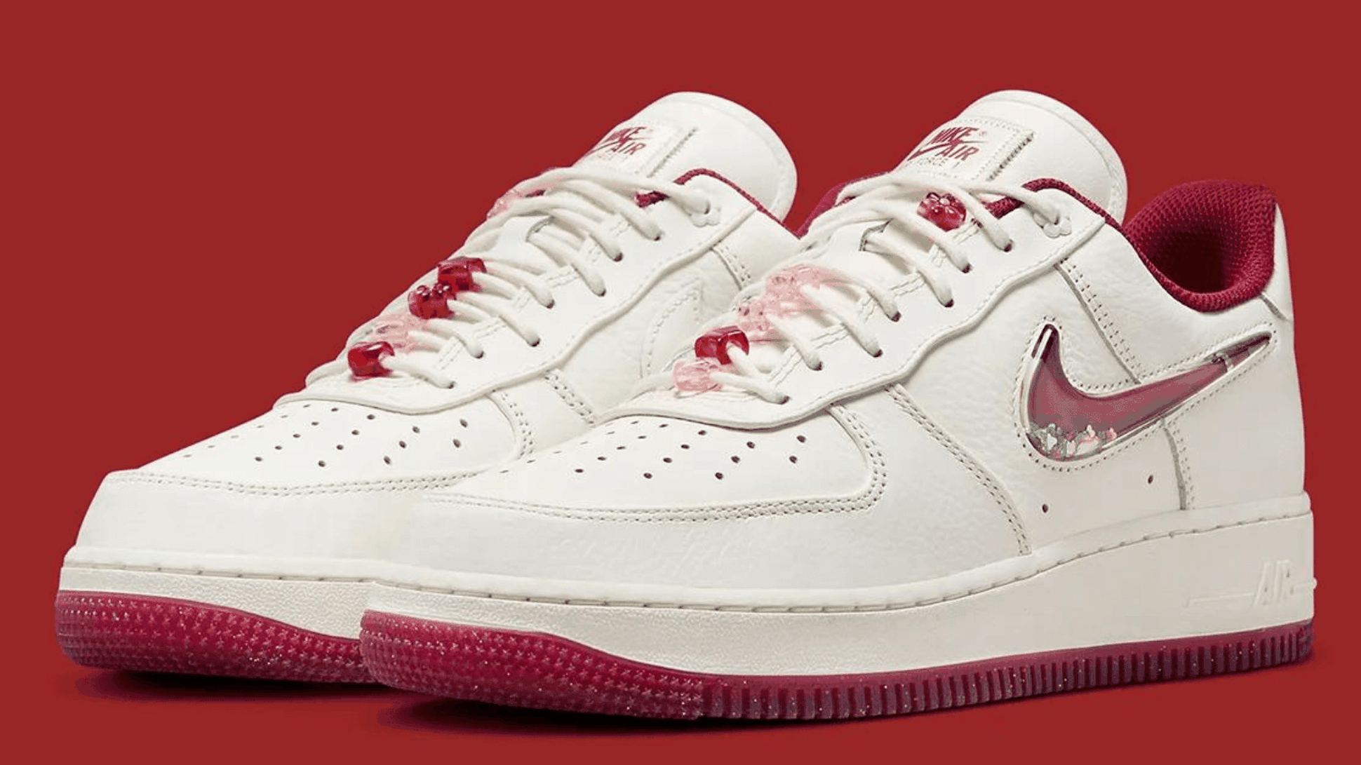 Nike blanche signe rouge best sale