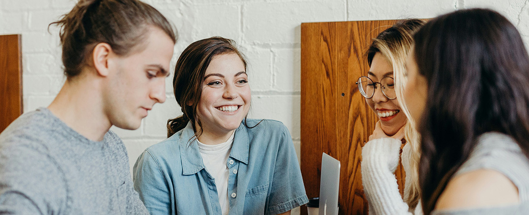 Team collaboration Hybrid team collaborating in a casual office environment