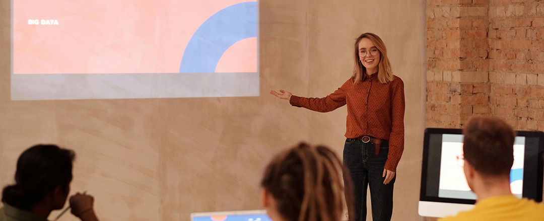 Professional giving a visual presentation during a collaborative business meeting