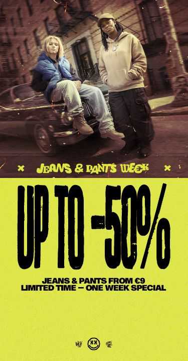 Two people pose on a car in urban setting; bold text reads "Up to -50%" on yellow background, promoting jeans and pants sale.