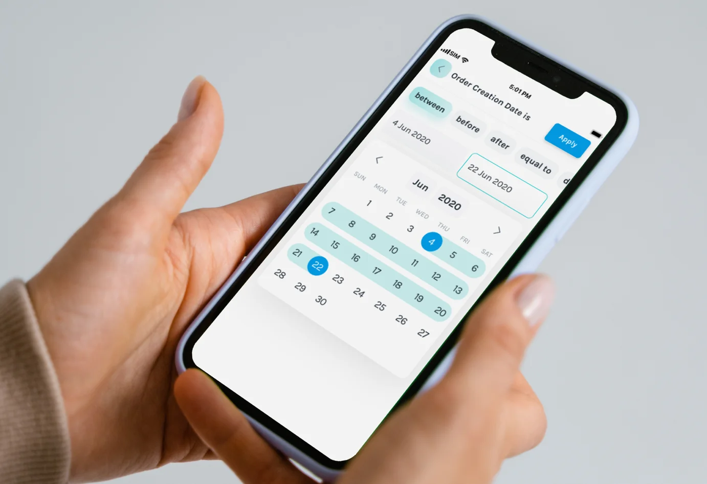 Picture of person holding smartphone in hands, picking dates in the Easyship mobile application interface.