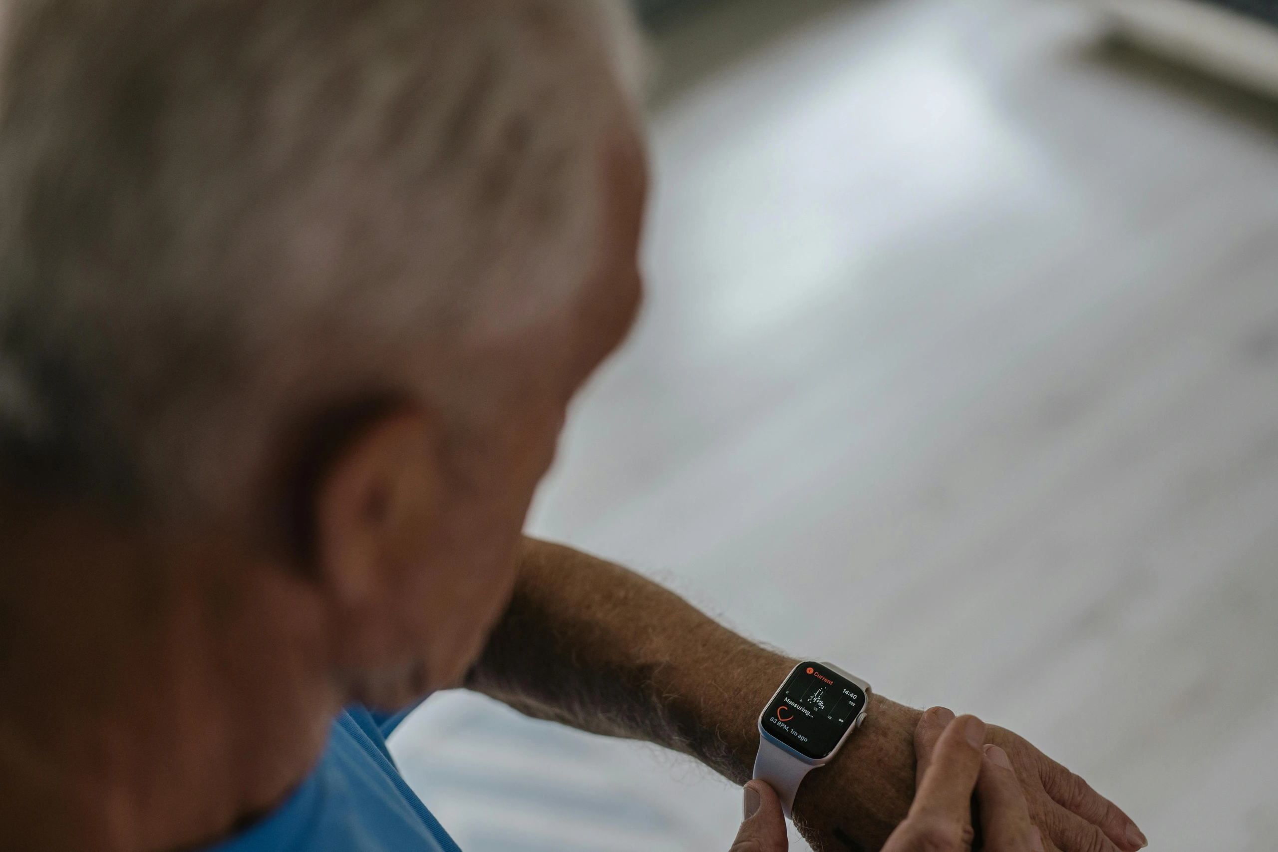 Picture of a senior adult with a smart watch.