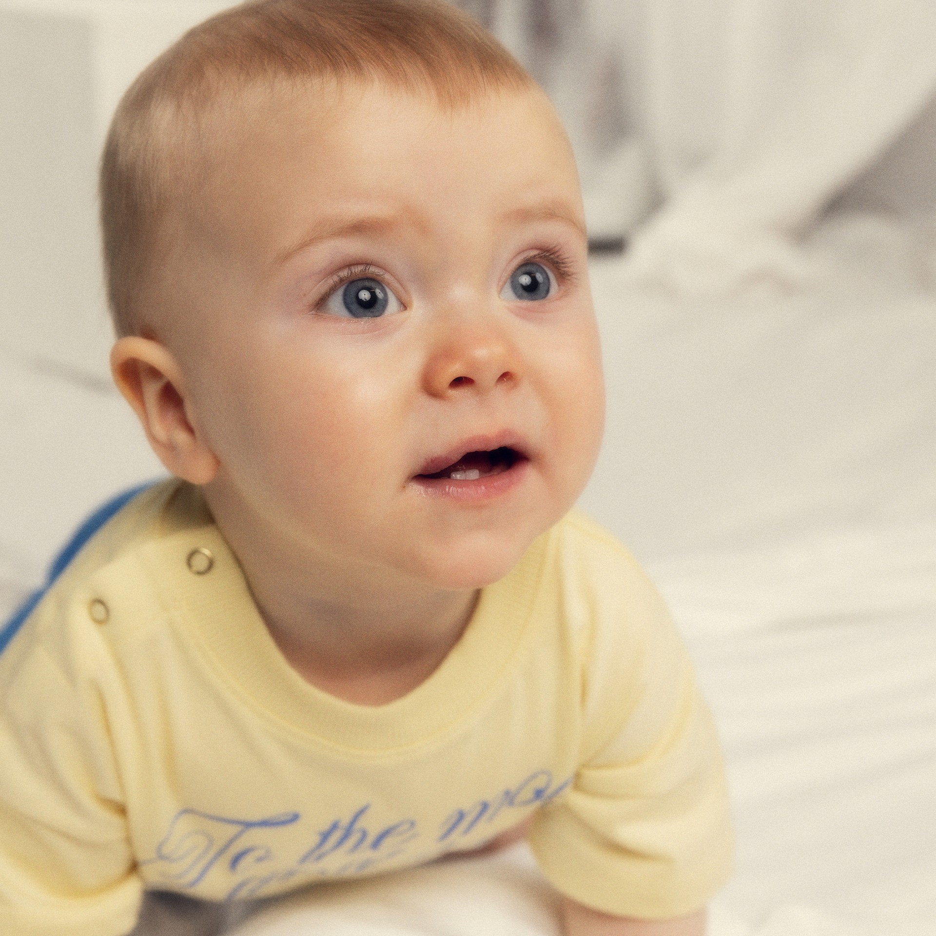 Baby wearing To the moon and back T-shirt from Mini Rodini