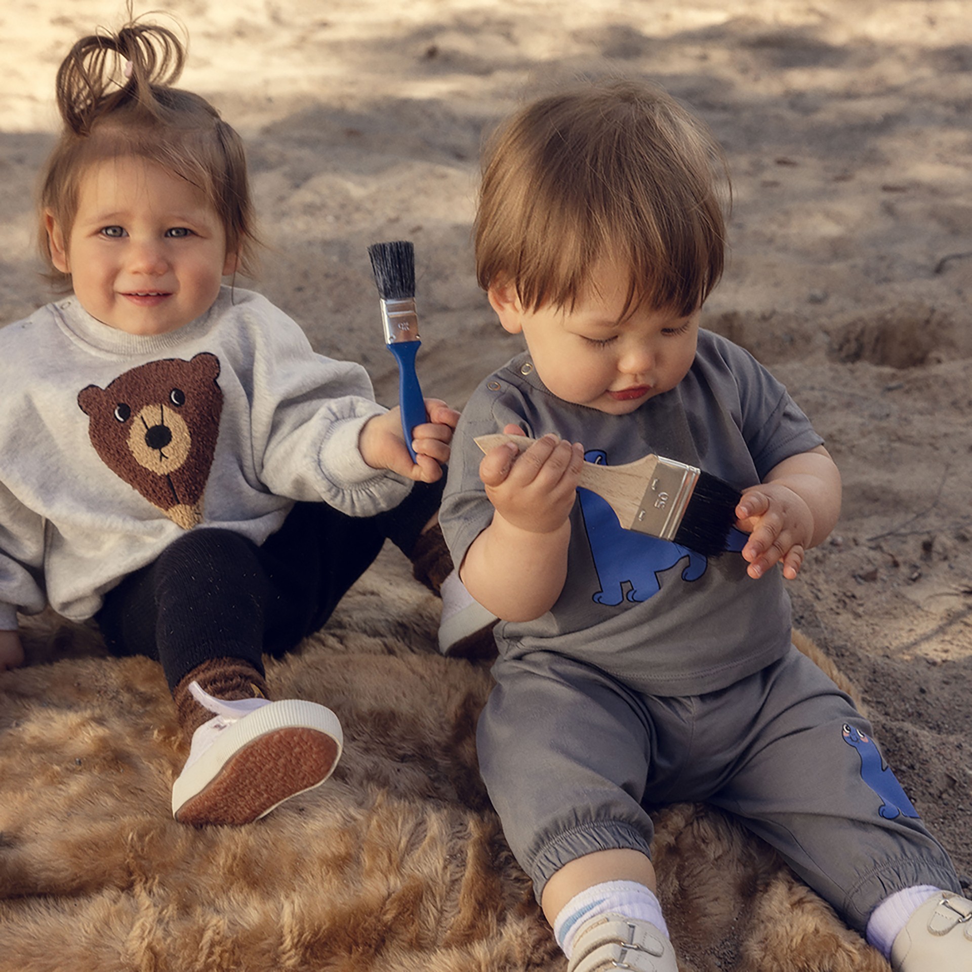 Babies wearing Mini Rodinis new collection digging deep