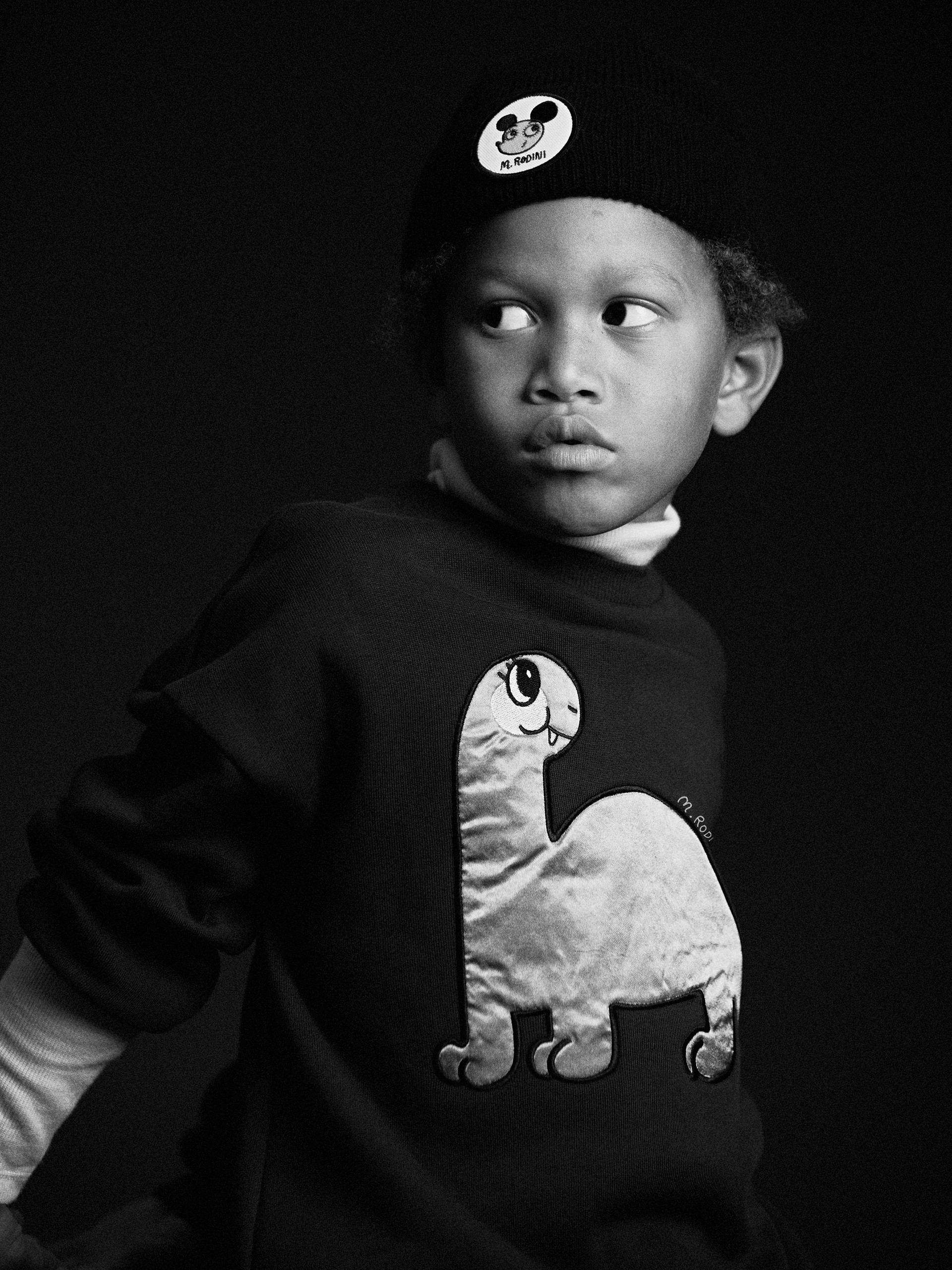 Black and white image of Dino application sweatshirt from Digging deep collection Mini Rodini