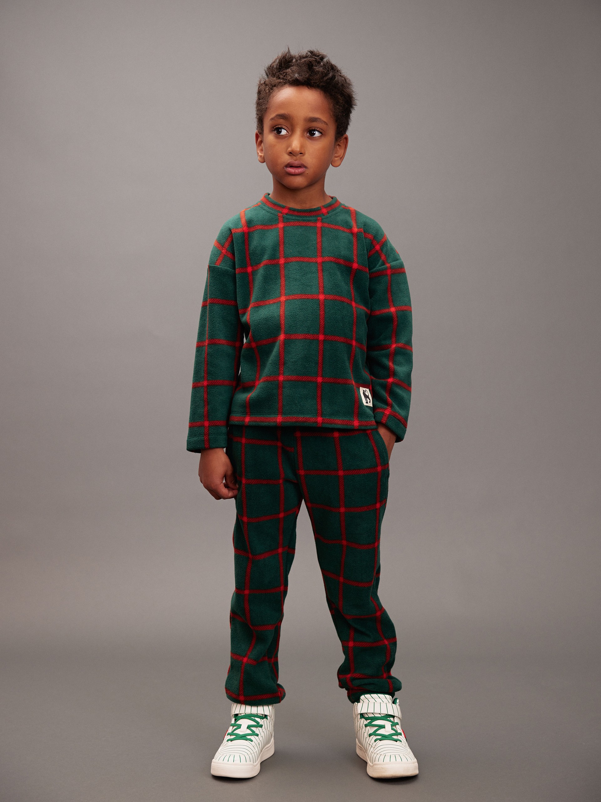 Boy wearing Plaid fleece from Mini Rodini