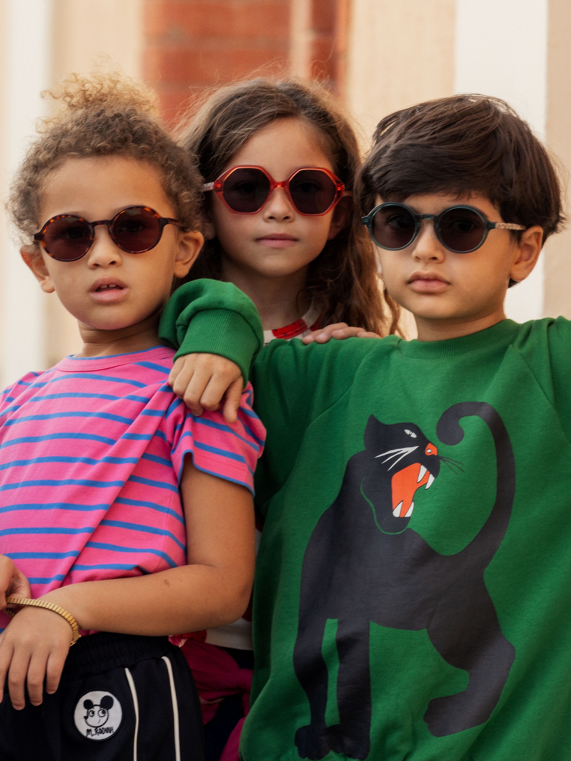 Kids wearing clothes from Mini Rodini Spring shop