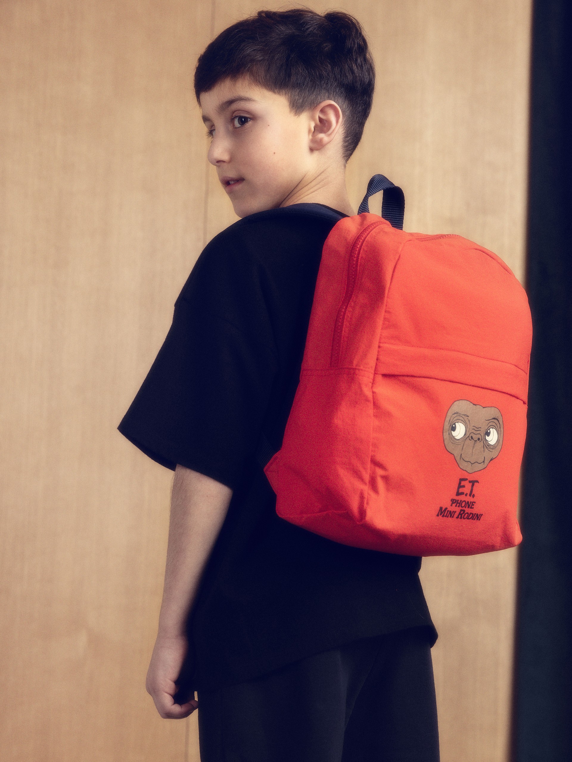 Boy wearing E.T embroiderd lightweight backpack from Mini Rodini x E.T collection