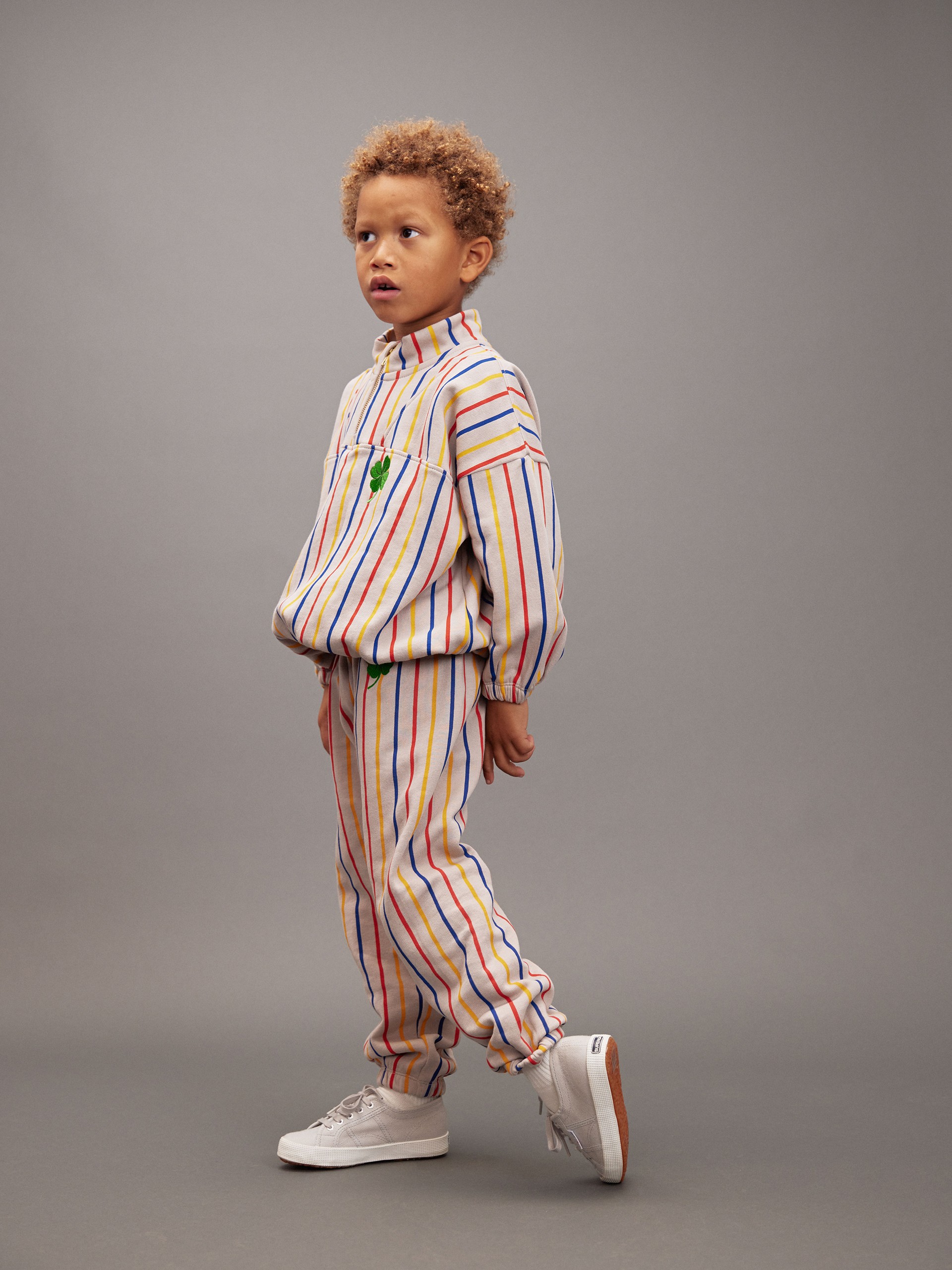 Boy wearing clover sweat set from Mini Rodini