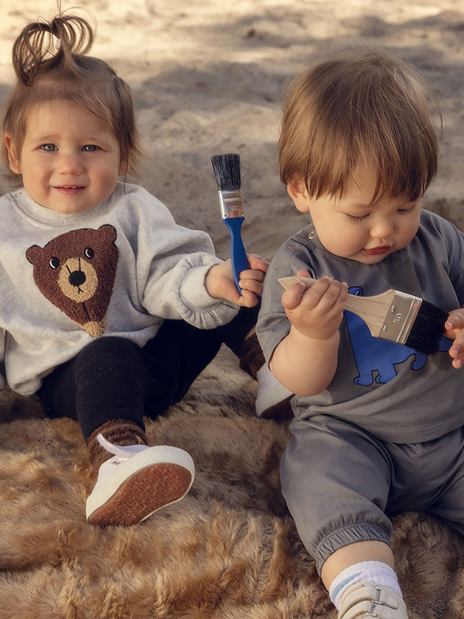 Baby wearing Leopard Faux Fur Baby Overall from Mini Rodini