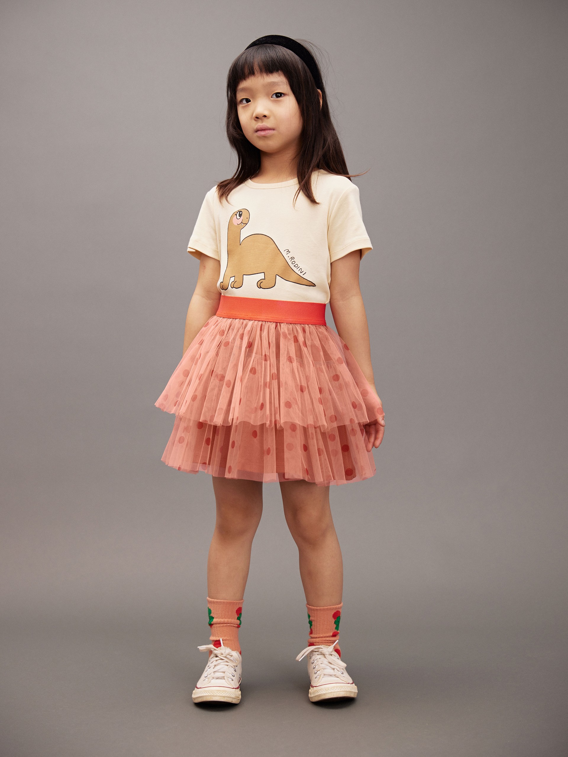 Girl wearing Dino T-shirt and Dotted tulle skirt from Mini Rodini Digging deep collection