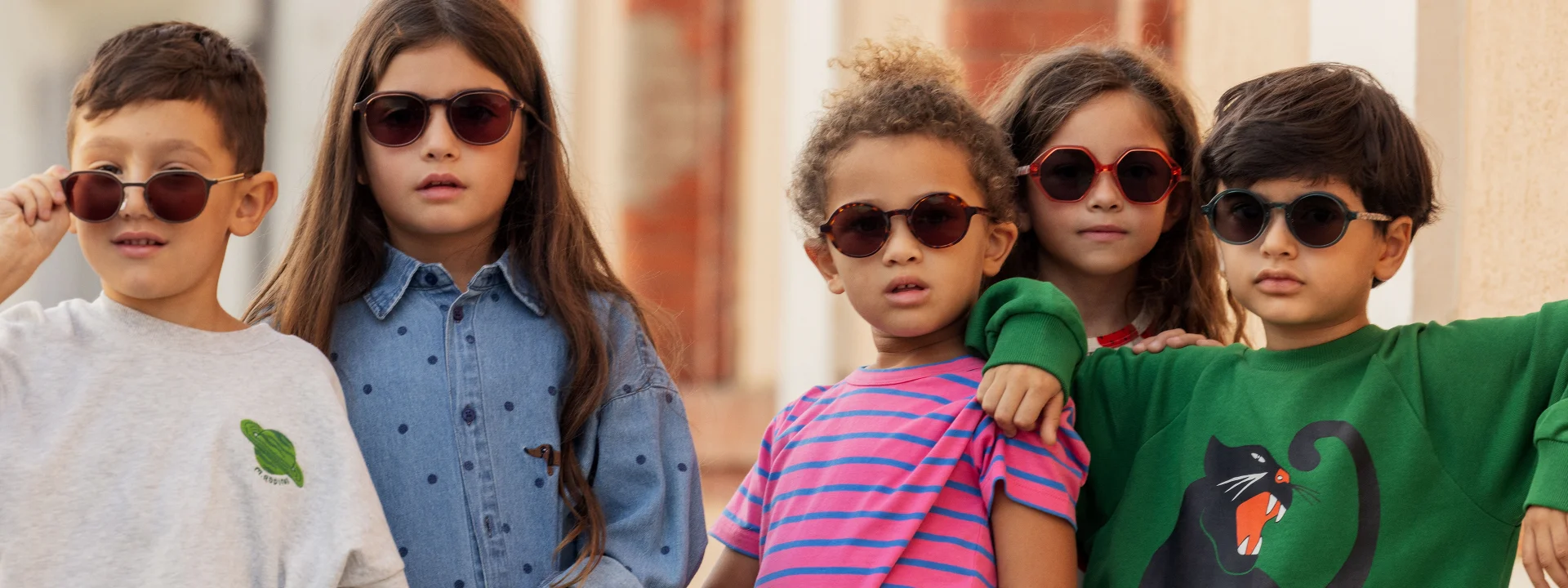 Kids wearing clothes from Mini Rodini Spring shop