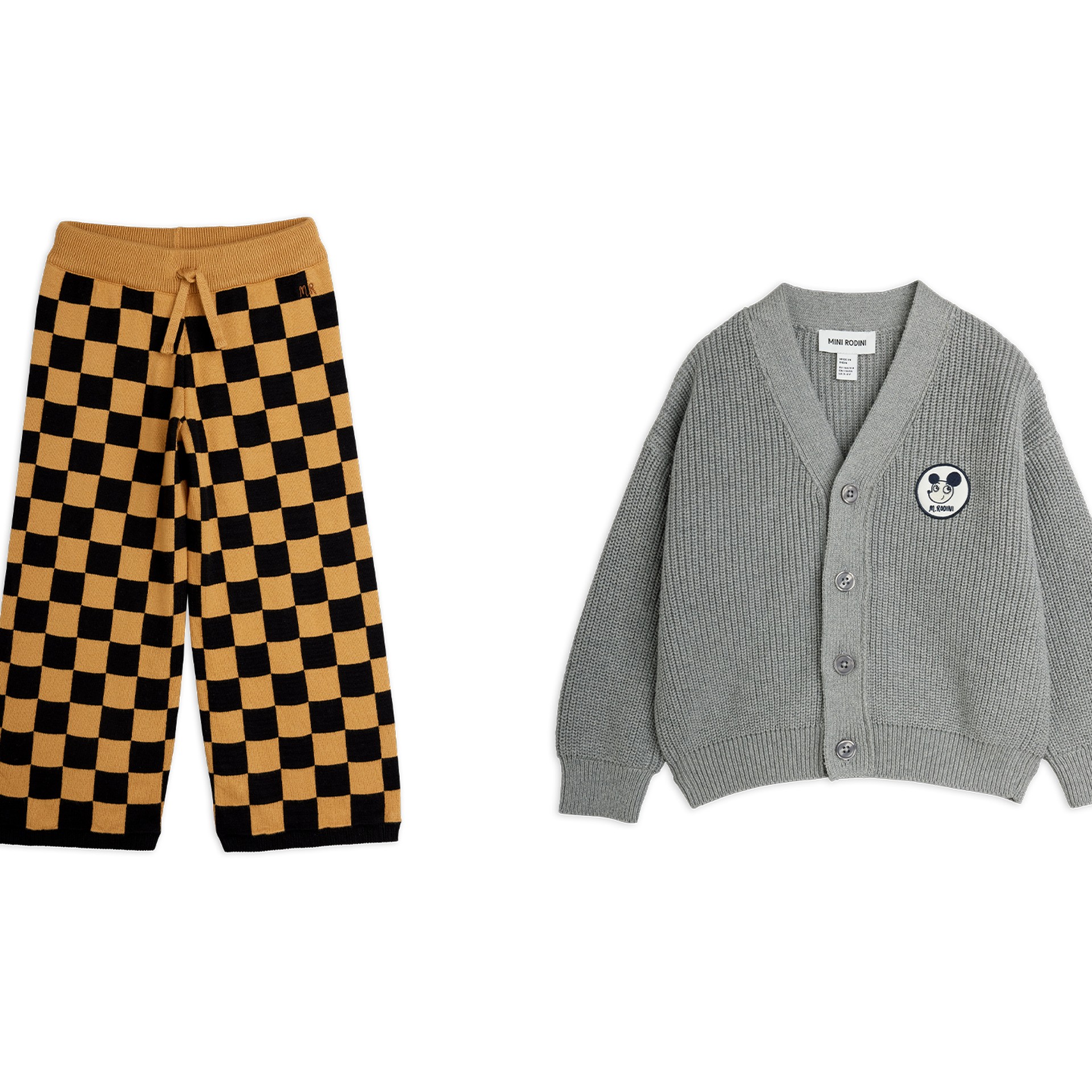 Gray cardigan, polka dot shirt, cat-printed dress, and checkered pants on white background.