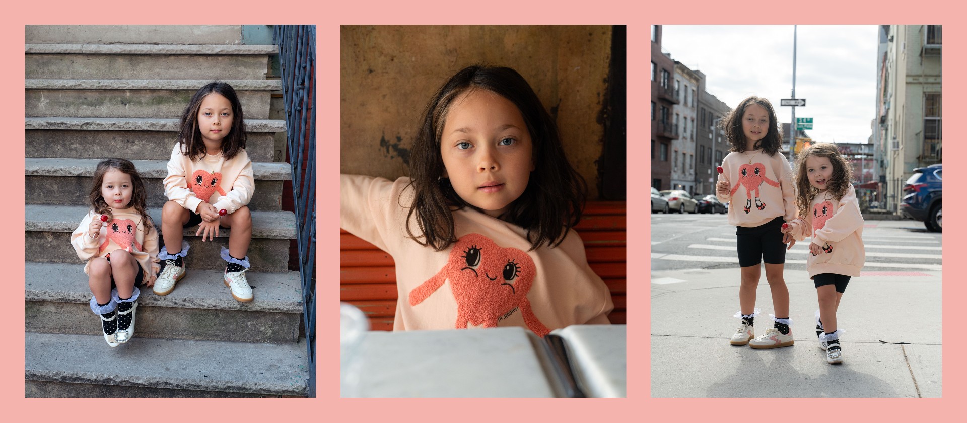 Two girls sitting on stairs wearing Hearts in shoe sweatshirt from Mini Rodini