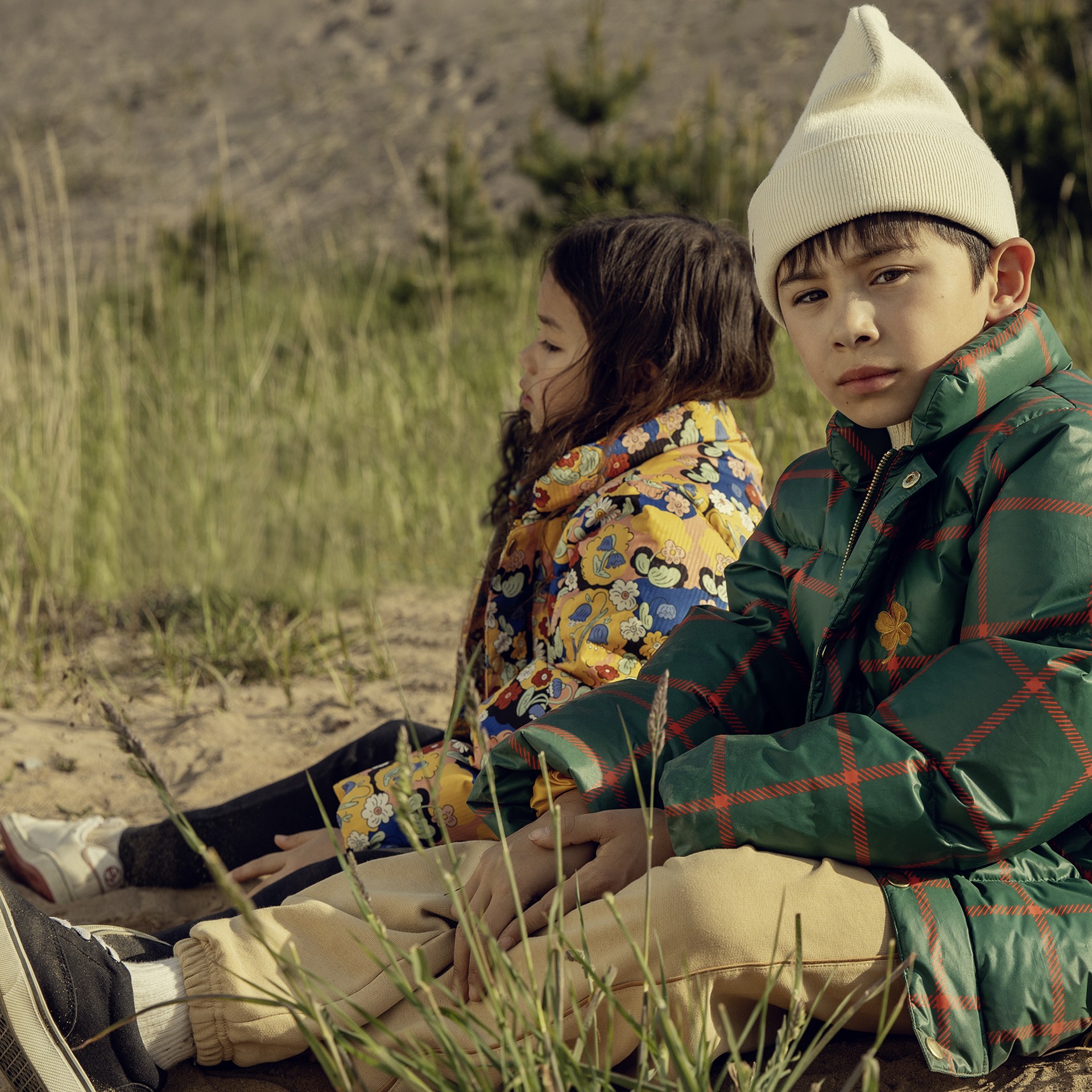 Fårö puffer and plaid check puffer from Mini Rodini