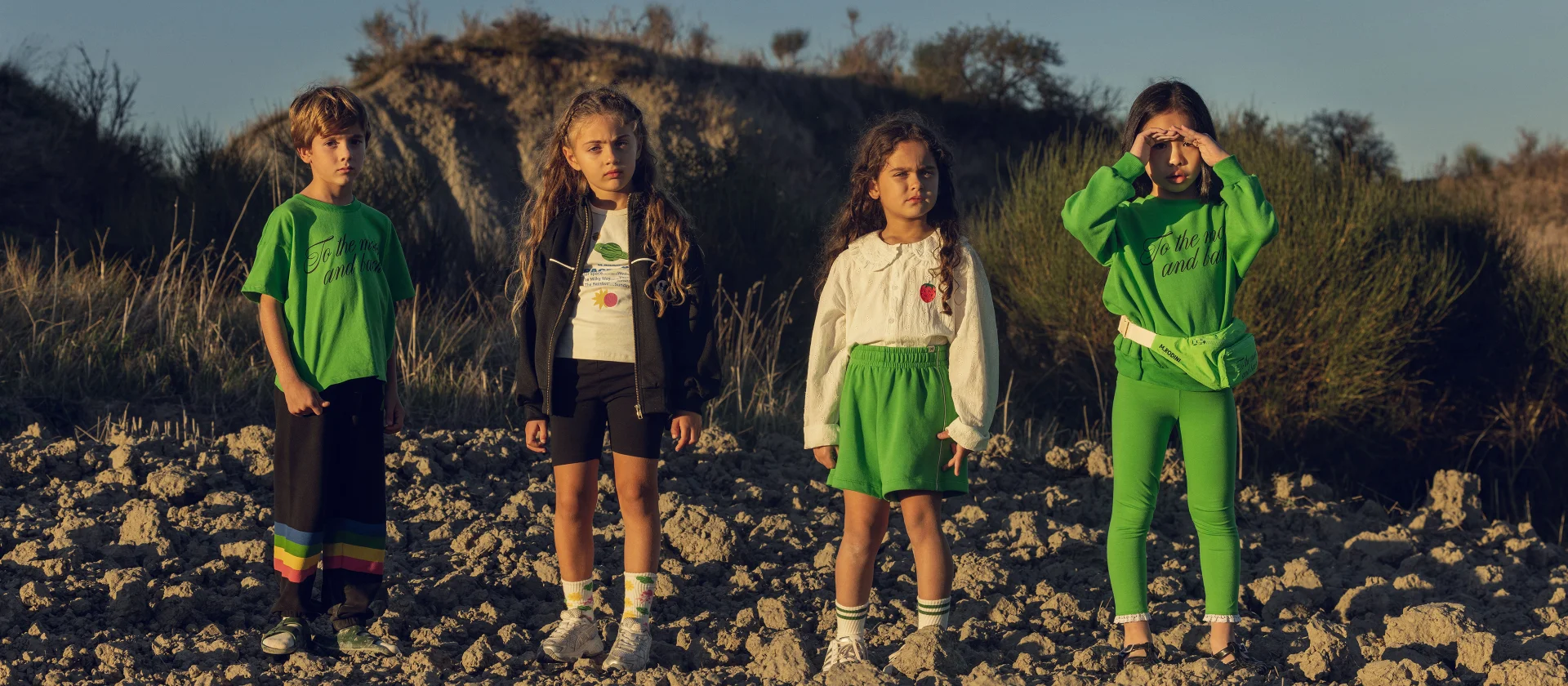 Two girls wearing Alien Affairs collection from Mini Rodini