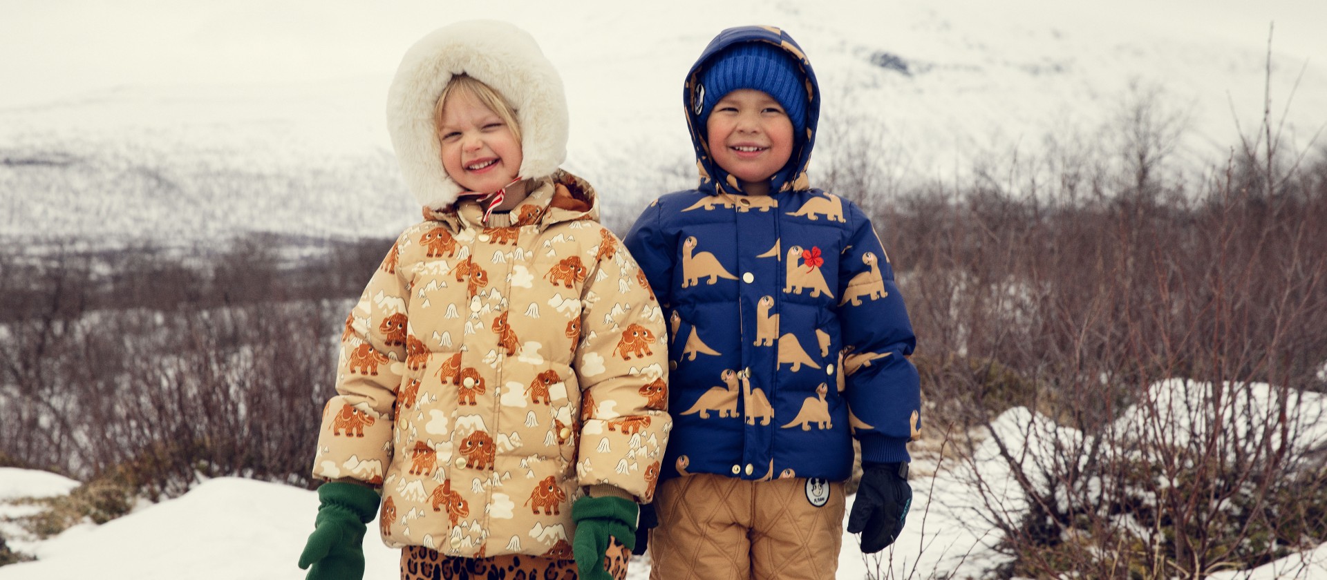 Kids wearing puffer jackets from Mini Rodini Winter shop