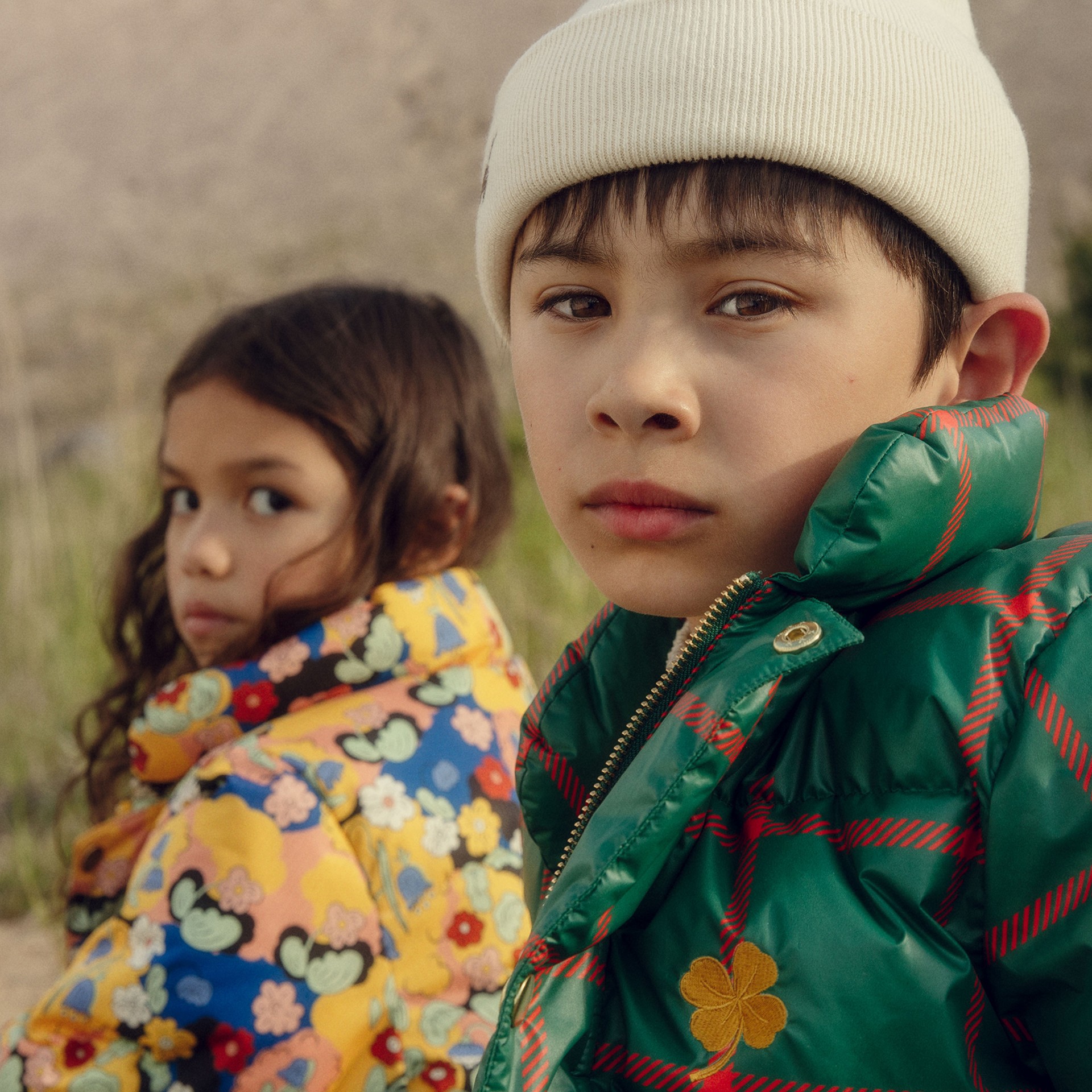 Fårö puffer and plaid check puffer from Mini Rodini