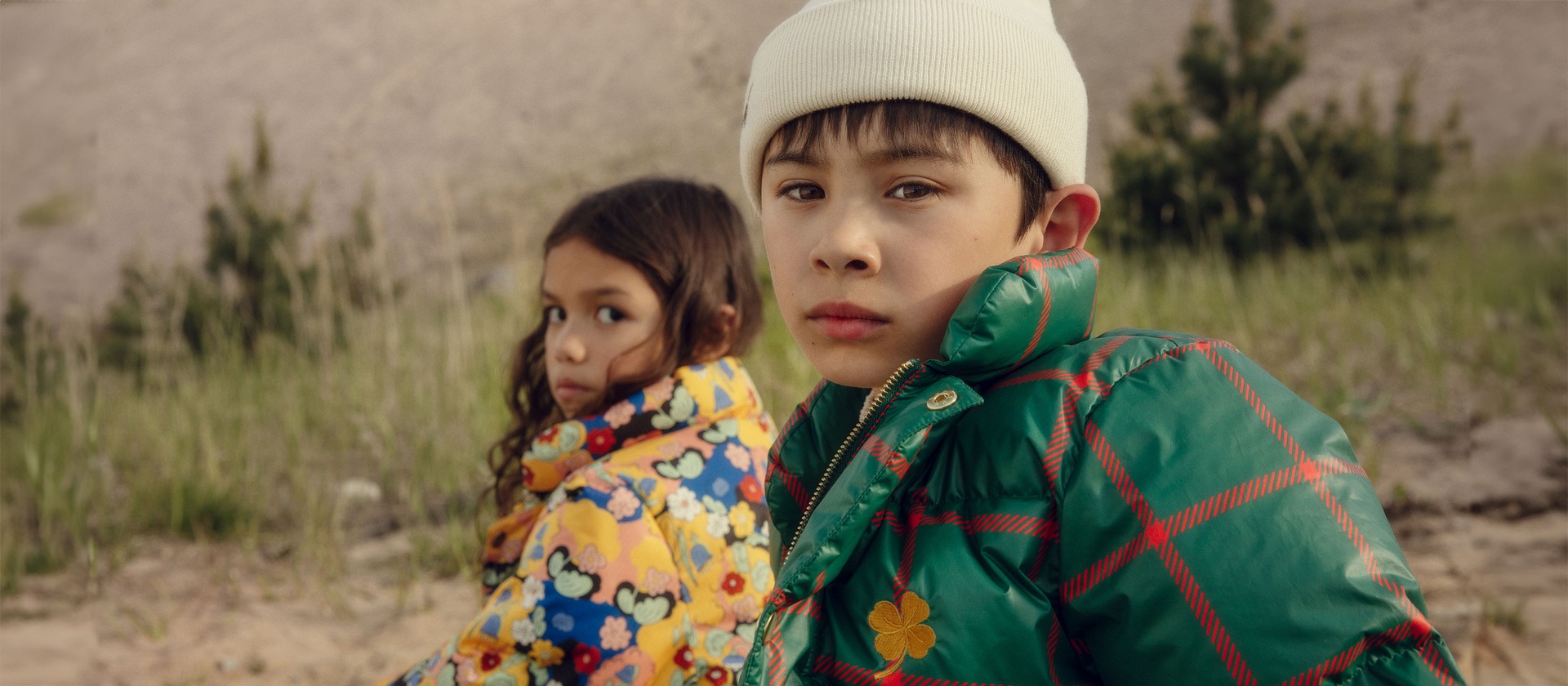 Fårö puffer and plaid check puffer from Mini Rodini