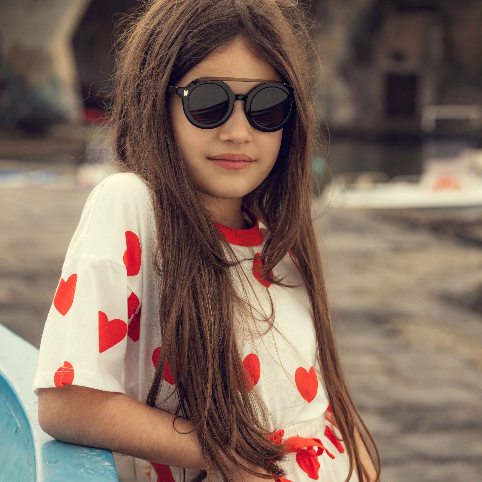 Girl wearing Hearts Mini Rodini print