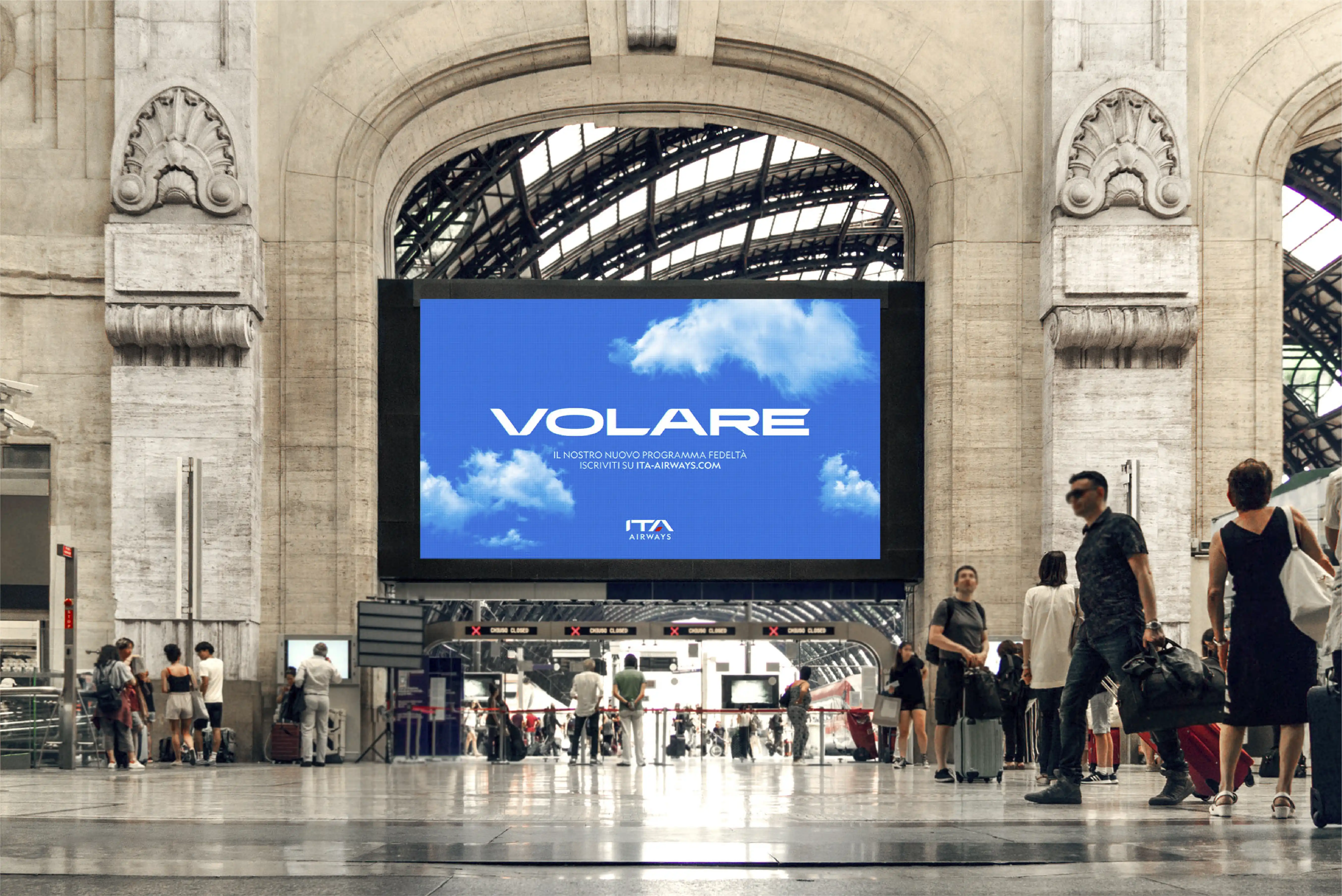 ITA Airways advertising in Milan railways station, showing Volare logo, the fidelity program of ITA Airways