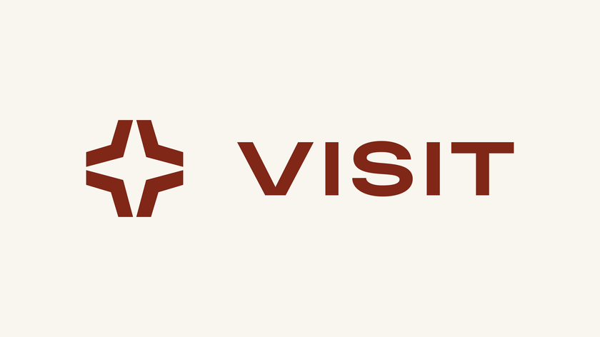 VISIT logo på beige bakgrund