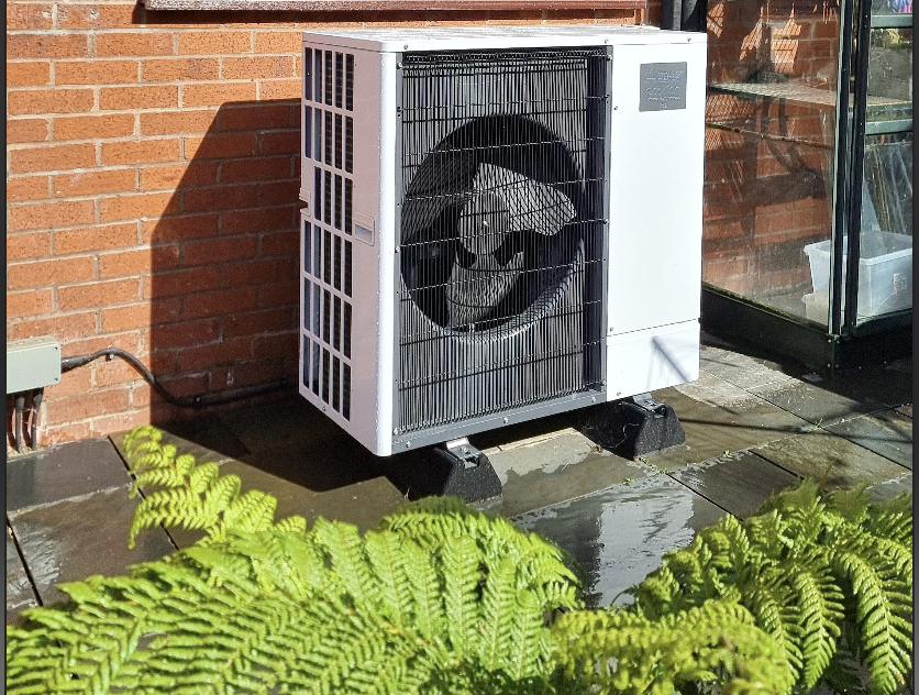 Image of a heat pump in a garden