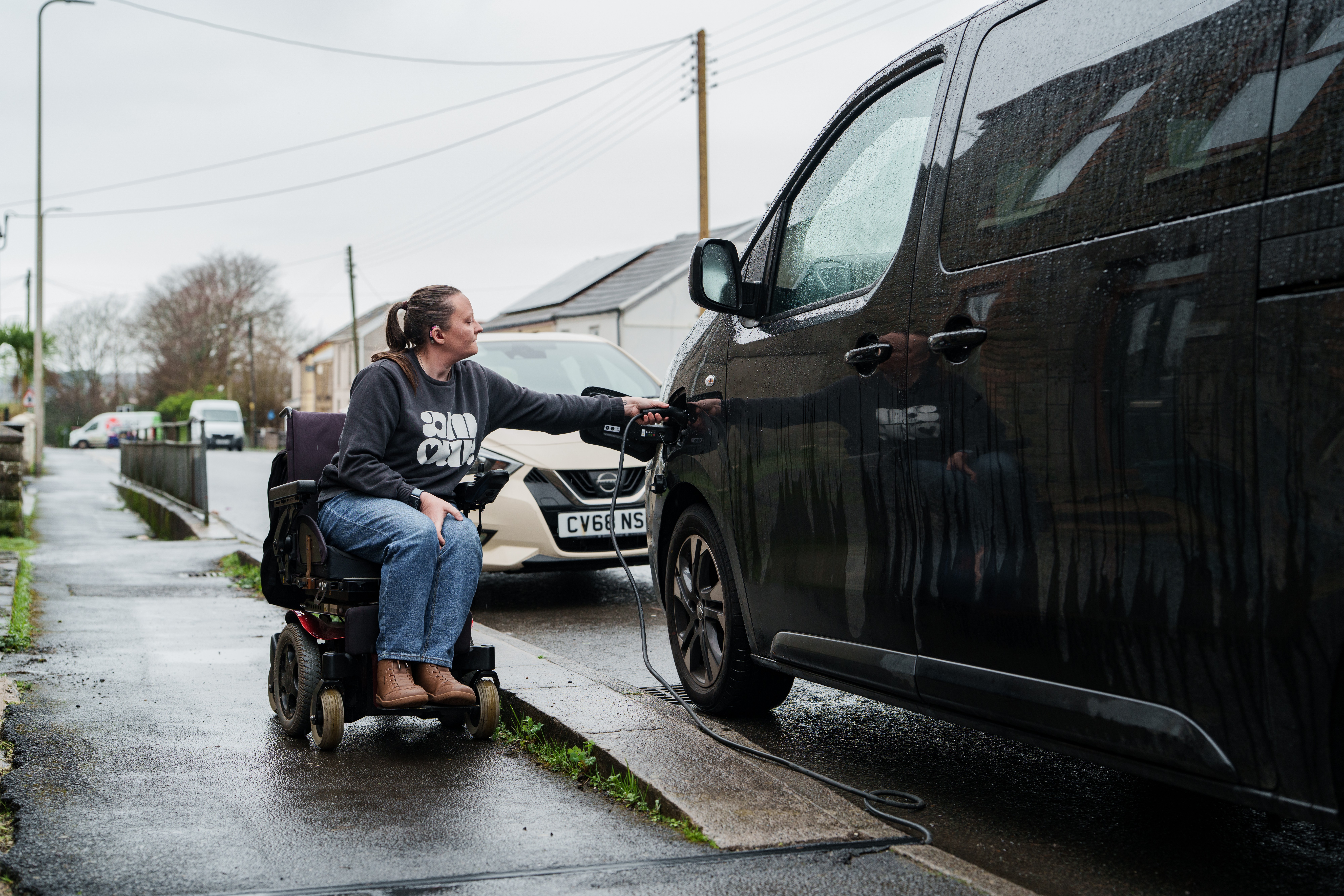 Lauren Francis plugging in her EV